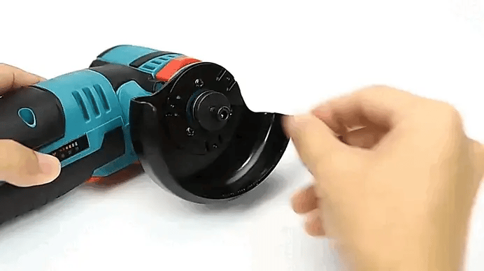 Spindle lock system on Mini Angle Grinder for easy disc swapping and improved user safety