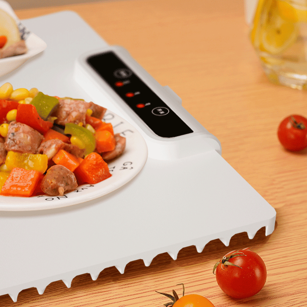 Close-up of Foldable Food Warmer surface with ceramic plate, showcasing even heat distribution and anti-slip design.