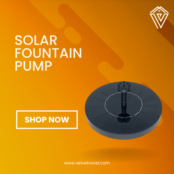 Solar Fountain Pump with nozzle attachment for birdbaths and garden decor on orange background