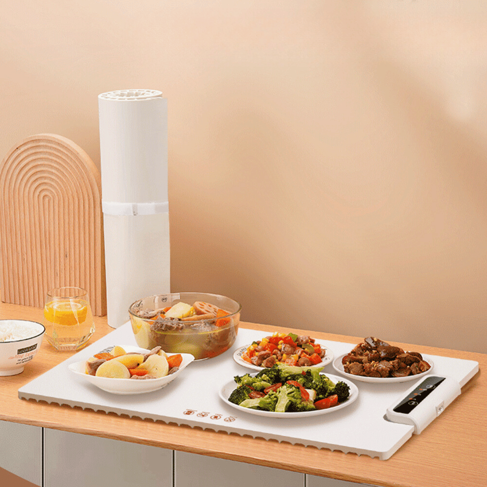 White Foldable Food Warmer heating multiple dishes simultaneously, perfect for family meals or gatherings.